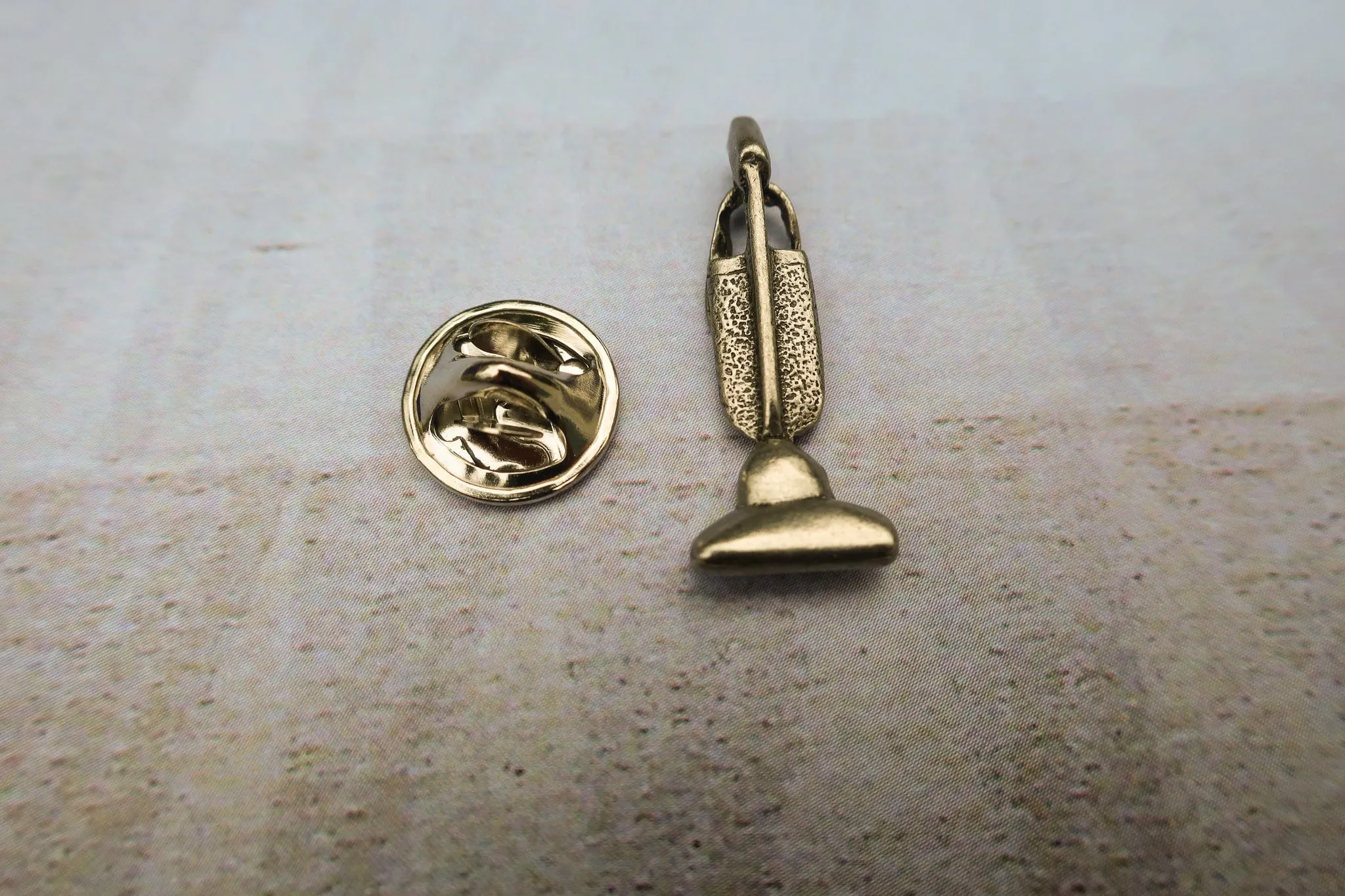 Vacuum Lapel Pin