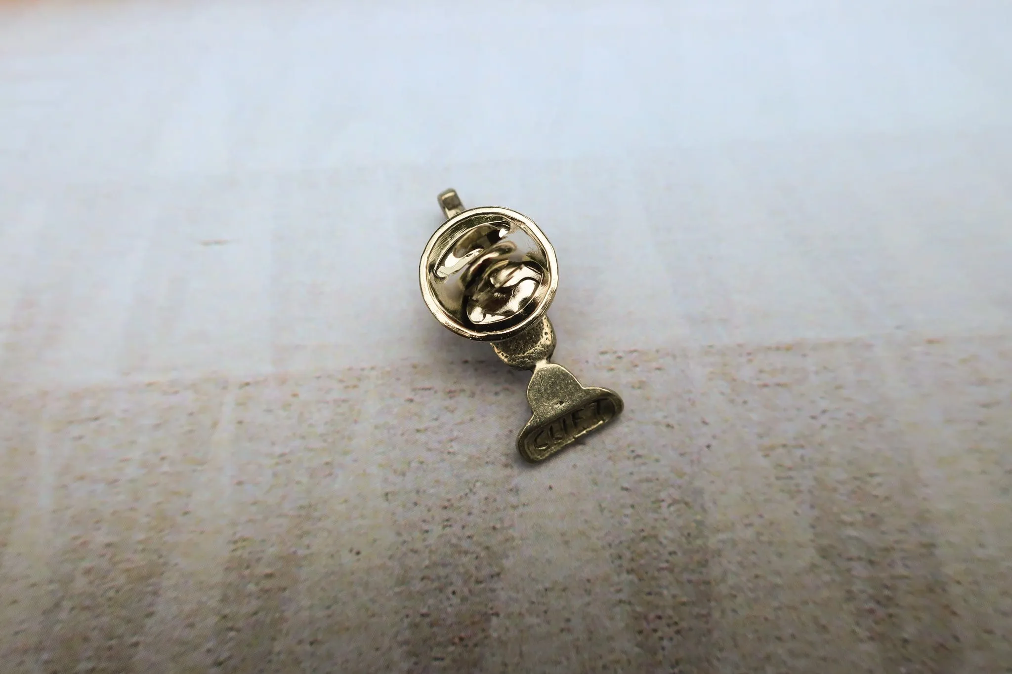 Vacuum Lapel Pin