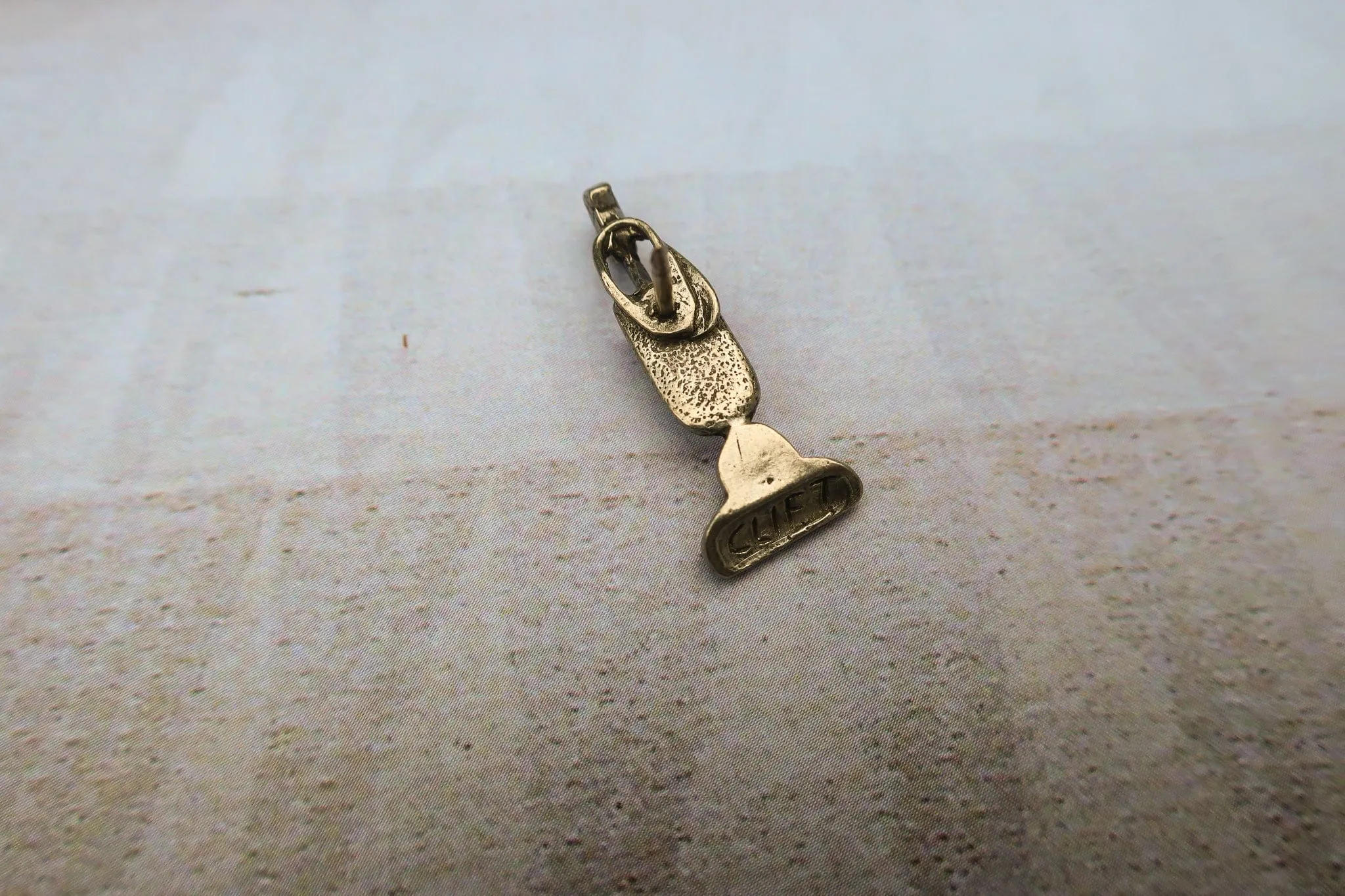 Vacuum Lapel Pin